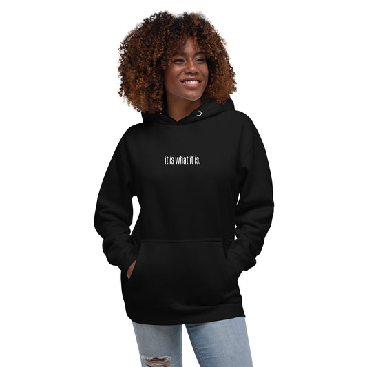 Person wearing a black hoodie with text on a white background