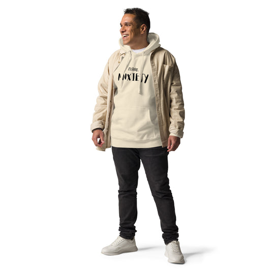 Man wearing a beige jacket and hoodie with text on a white background