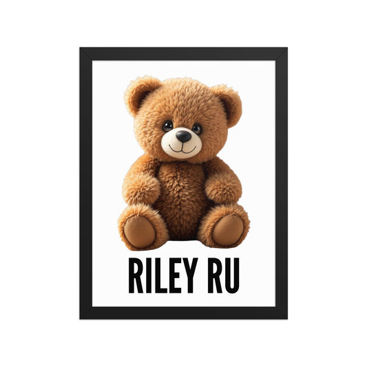 Framed picture of a brown teddy bear with 'RILEY RU' text on a white background