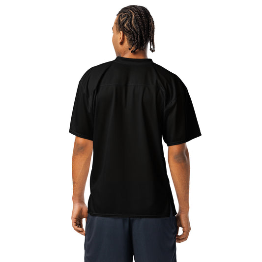 Person wearing a black shirt on a white background