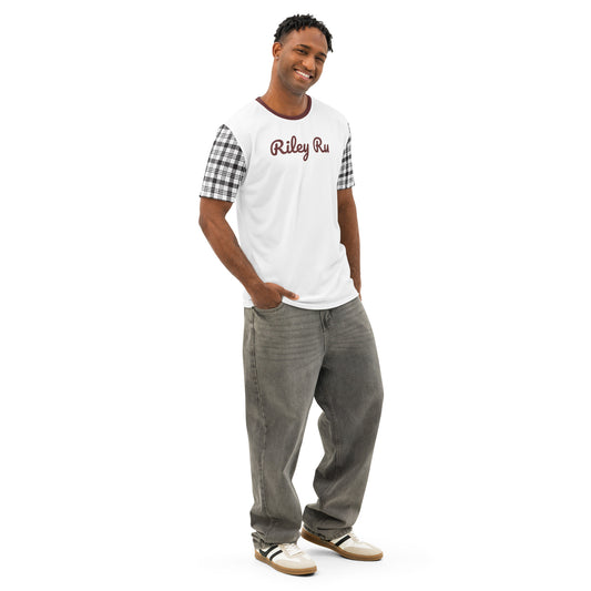 Man wearing a white t-shirt with plaid sleeves and gray pants on a white background