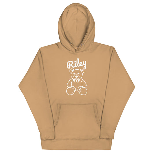 Tan hoodie with a bear graphic and 'Riley' text on a white background