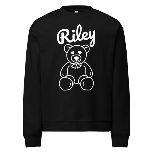 Black sweatshirt with a white teddy bear graphic and 'Riley' text on a white background