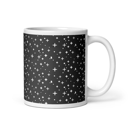 White mug with black pattern of white stars on a white background
