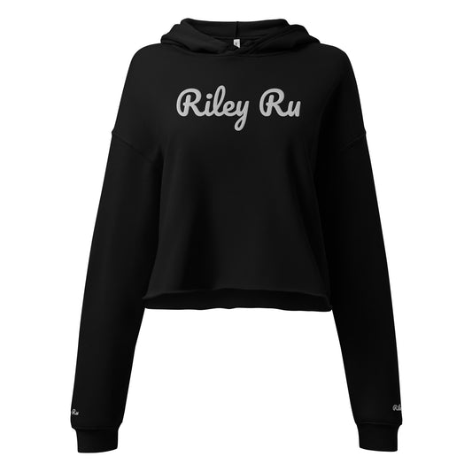 Black hoodie with 'Riley Ru' text on a white background